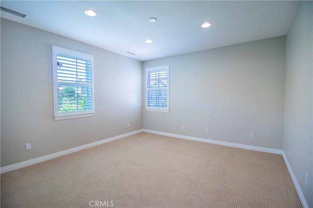 4684 Luna Court Calabasas, CA 91302 - Photo 24 of 48 an empty room with windows
