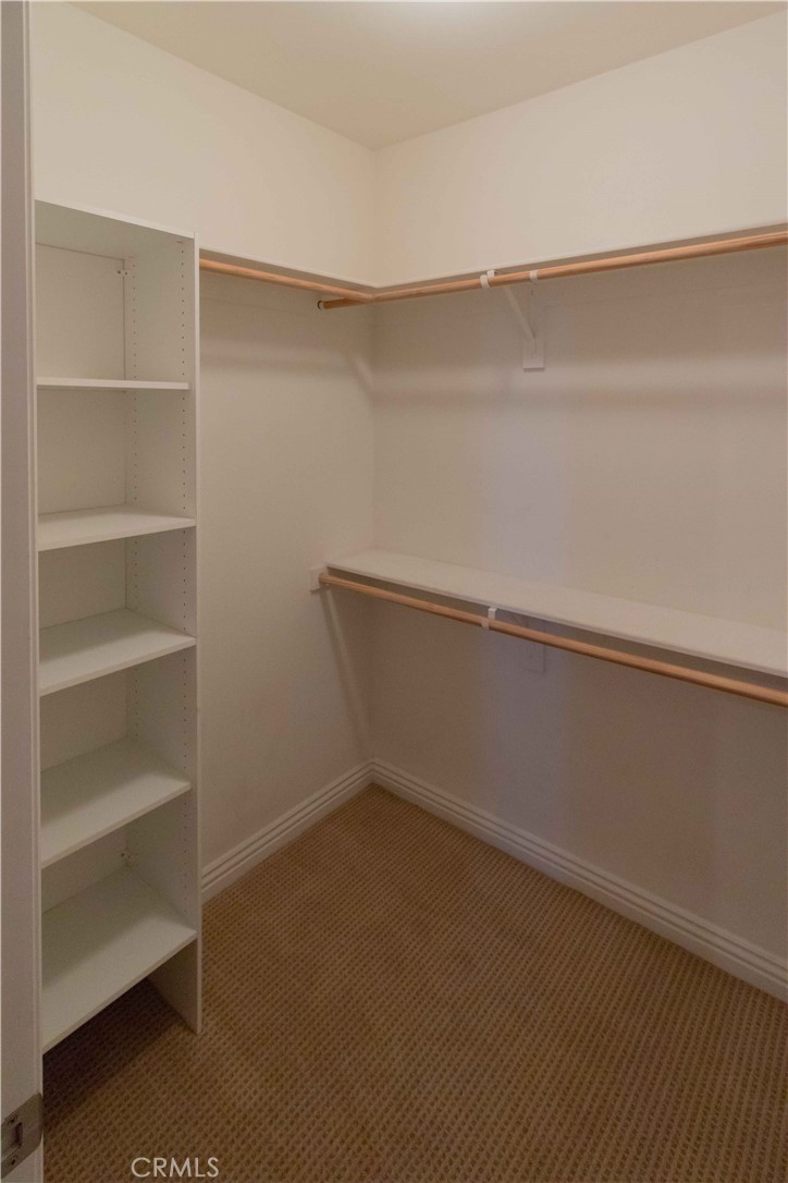4684 Luna Court Calabasas, CA 91302 - Photo 25 of 48 a view of an empty walk in closet