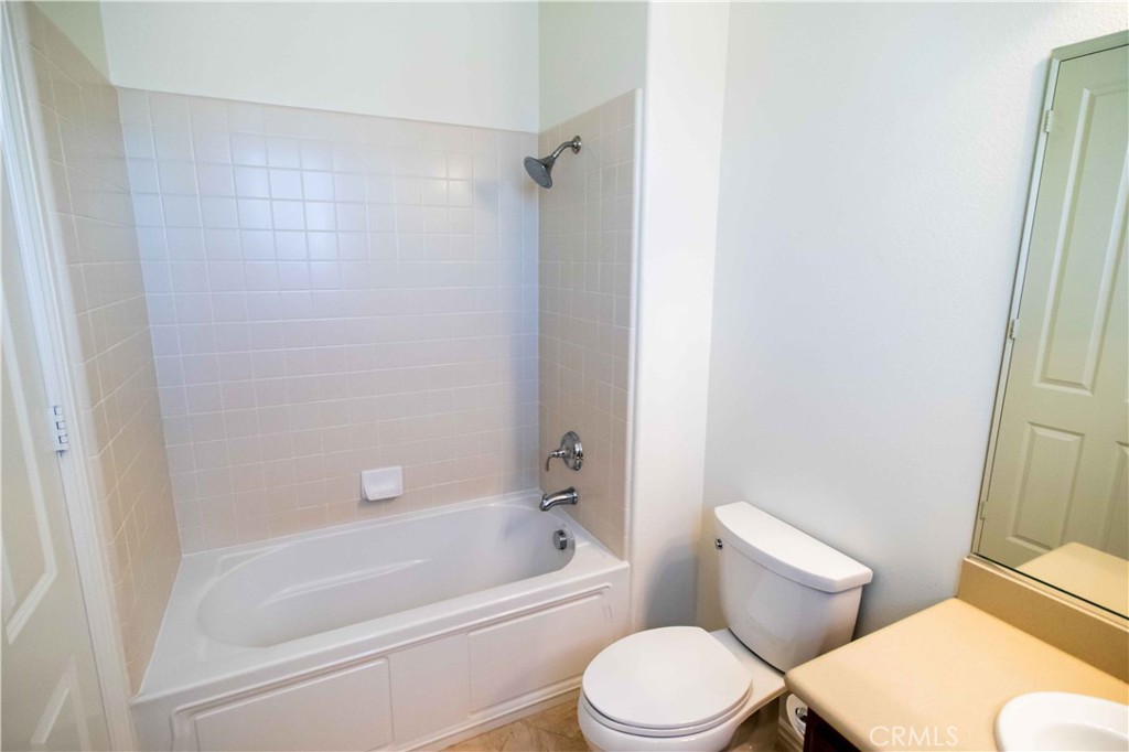 4684 Luna Court Calabasas, CA 91302 - Photo 26 of 48 a bathroom with a toilet and a bathtub