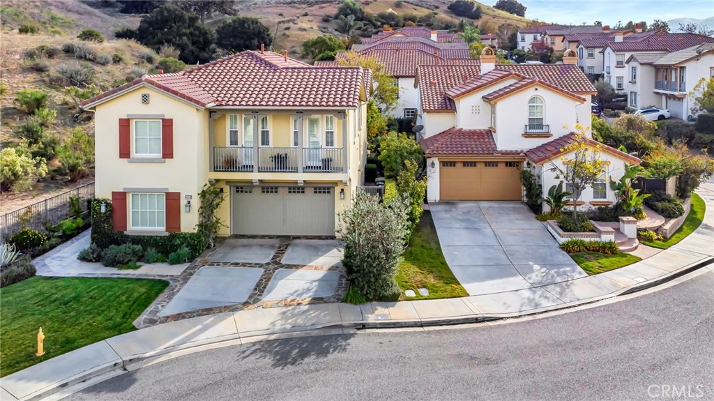 4684 Luna Court Calabasas, CA 91302 - Photo 42 of 48 front view of a house with a yard