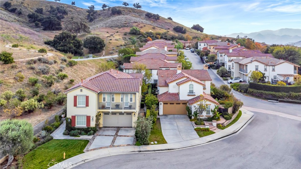4684 Luna Court Calabasas, CA 91302 - Photo 44 of 48 a view of a city with tall buildings