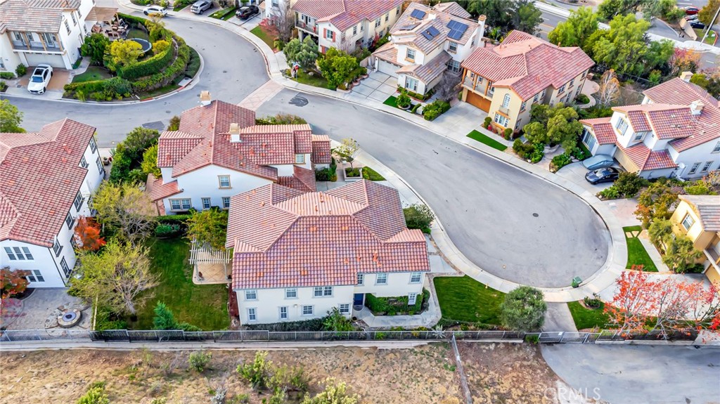 4684 Luna Court Calabasas, CA 91302 - Photo 45 of 48 an aerial view of a house with a swimming pool and outdoor seating