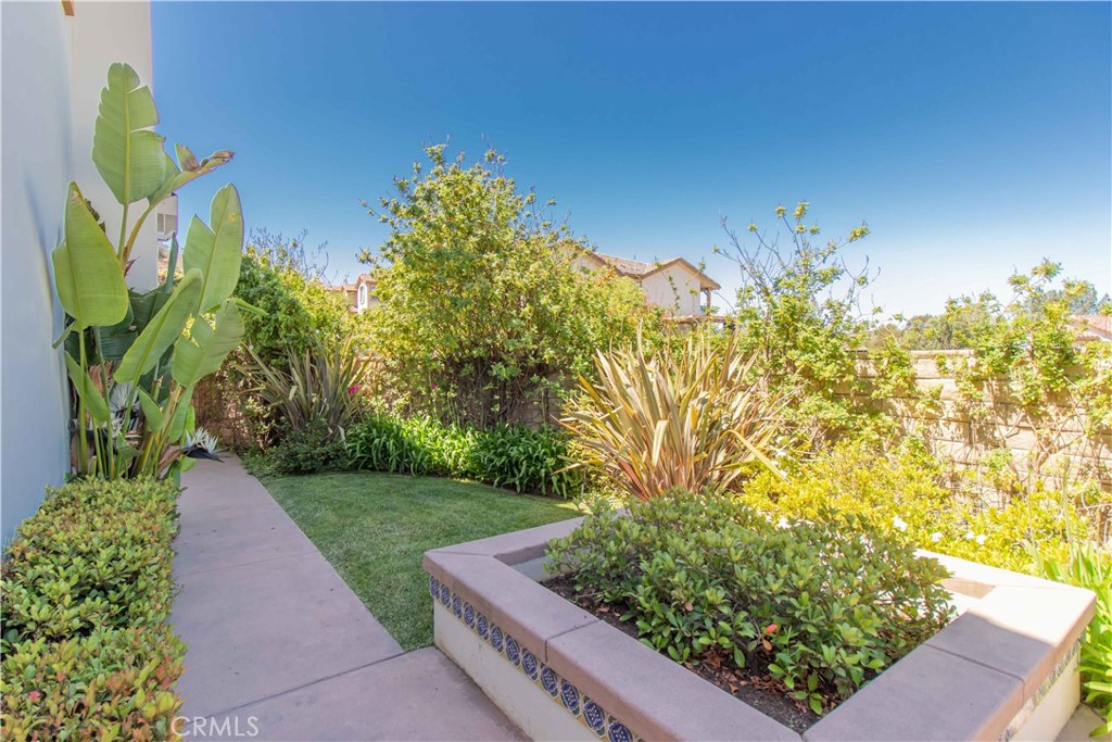 4684 Luna Court Calabasas, CA 91302 - Photo 9 of 48 a view of a garden with flowers