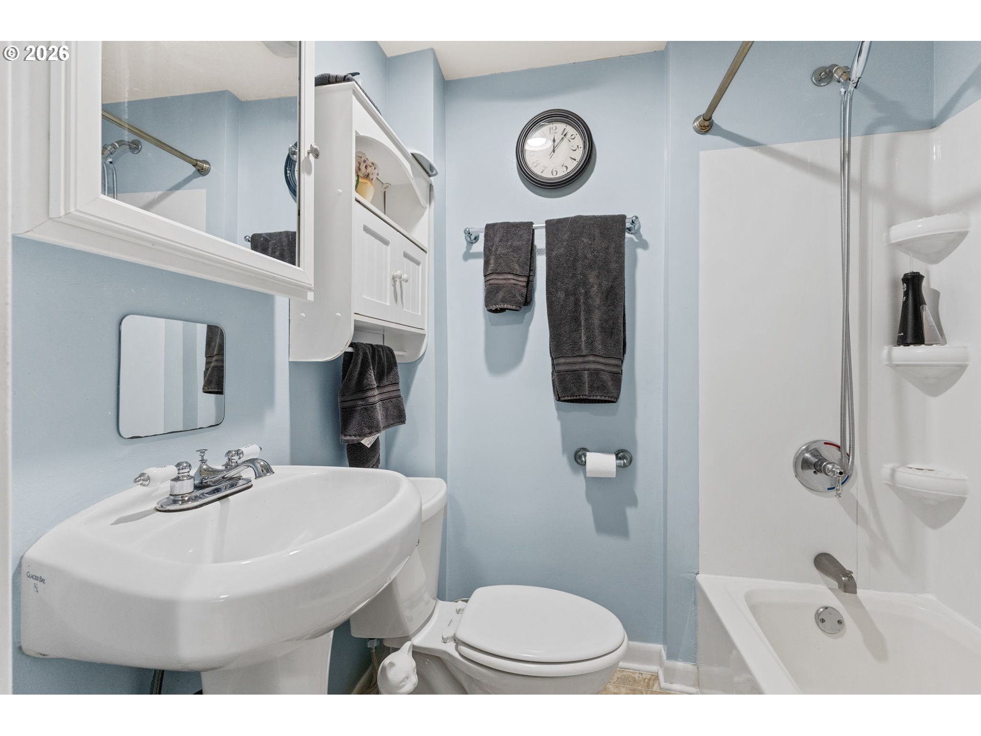 1071 Southwest Church Street Dallas, OR 97338 - Photo 15 of 27 a bathroom with a sink a toilet and shower