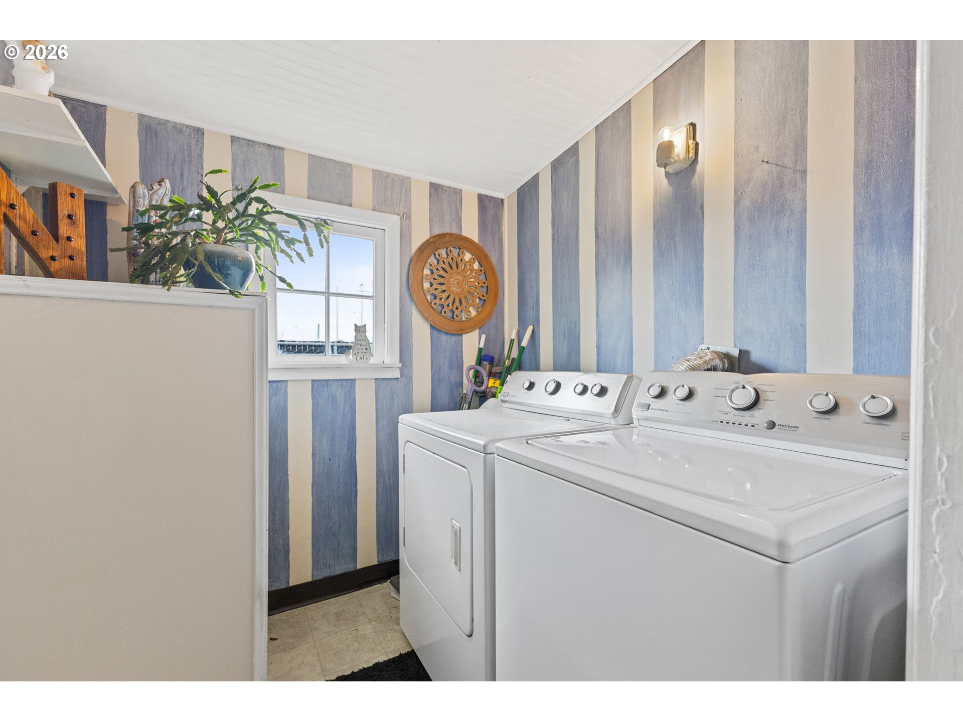 1071 Southwest Church Street Dallas, OR 97338 - Photo 19 of 27 a room with a sink a clock and a mirror