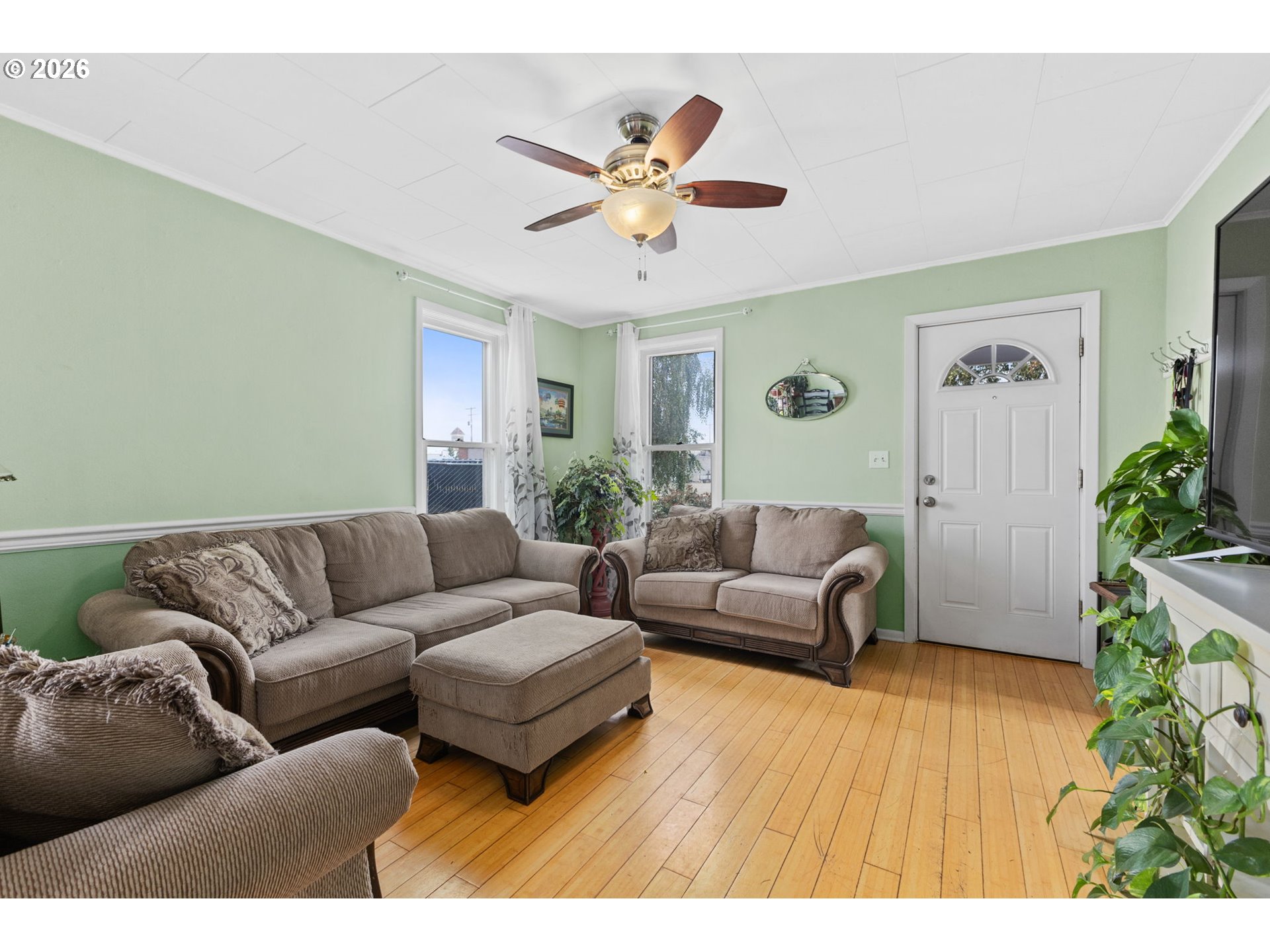 1071 Southwest Church Street Dallas, OR 97338 - Photo 5 of 27 a living room with furniture and a large window