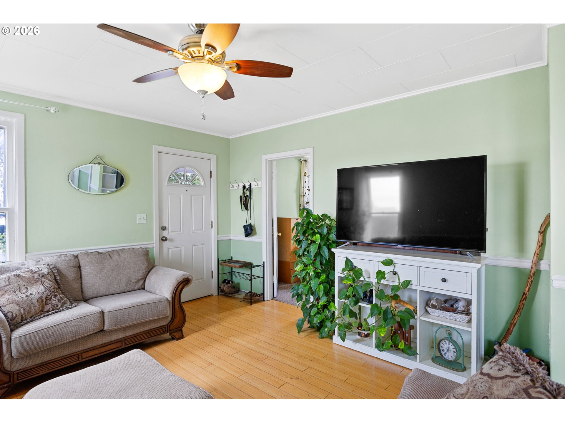 1071 Southwest Church Street Dallas, OR 97338 - Photo 6 of 27 a living room with furniture and a flat screen tv