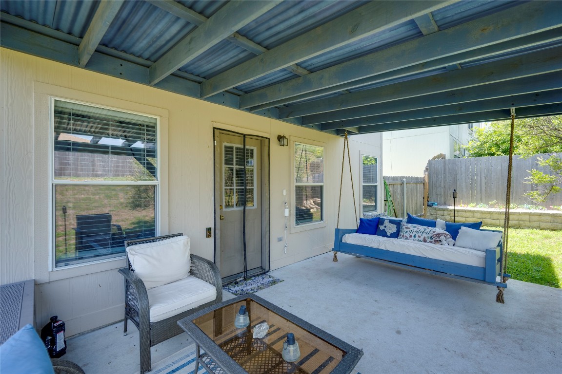 148 Buttercup Way Kyle, TX 78640 - Photo 32 of 40 a outdoor living space with furniture and a potted plant