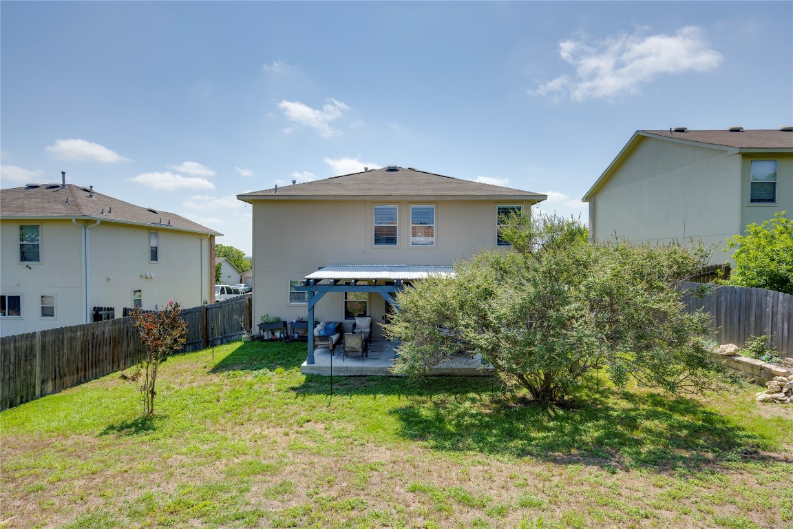 148 Buttercup Way Kyle, TX 78640 - Photo 39 of 40 a view of a house with backyard and sitting area