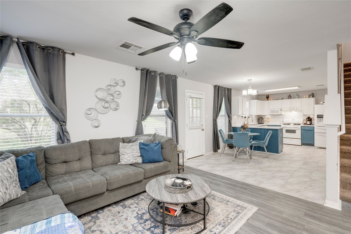 148 Buttercup Way Kyle, TX 78640 - Photo 10 of 40 a living room with furniture and a large window