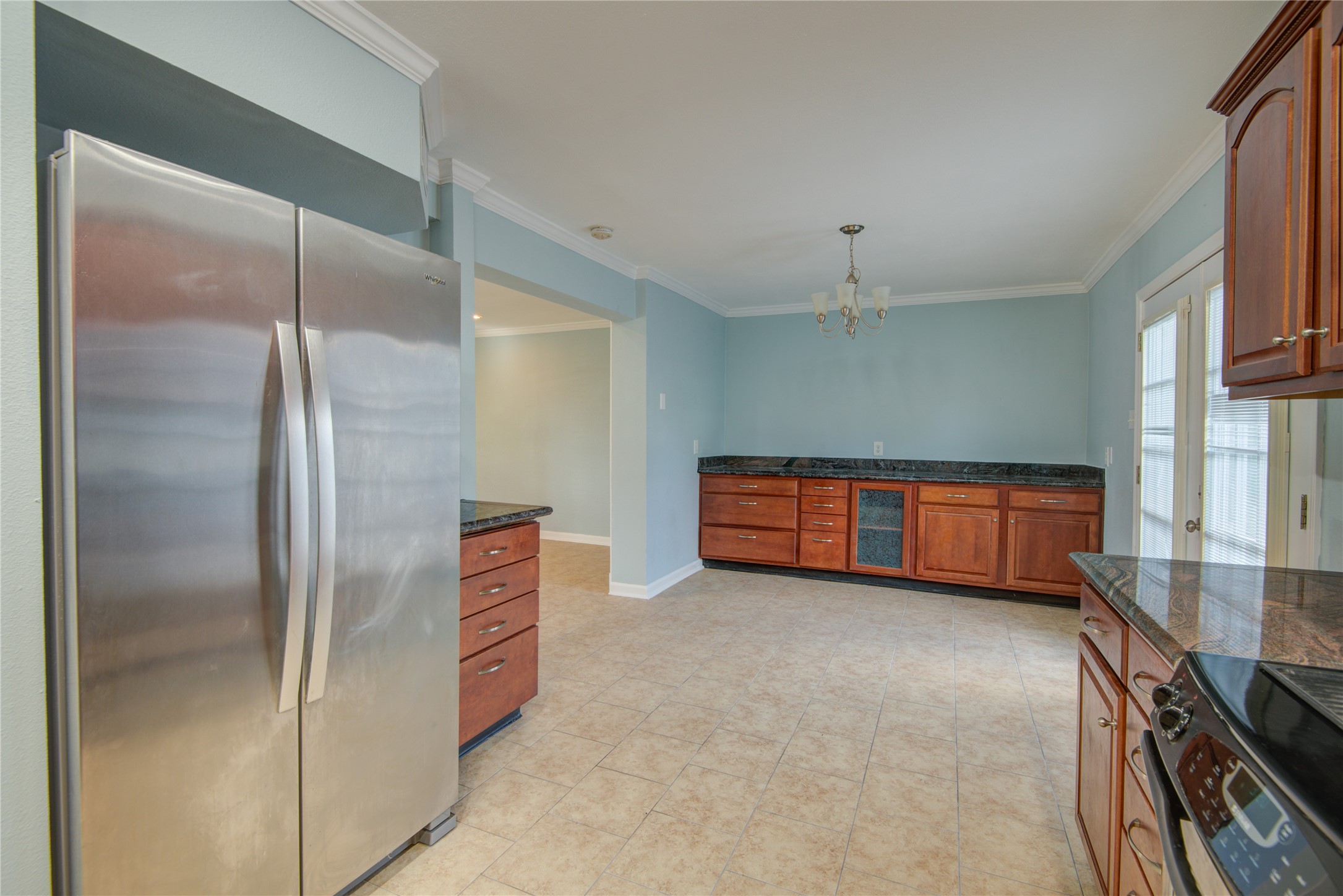 1424 Silverpines Road, Unit 1424 Houston, TX 77062 - Photo 15 of 33 a kitchen with stainless steel appliances a refrigerator and a stove