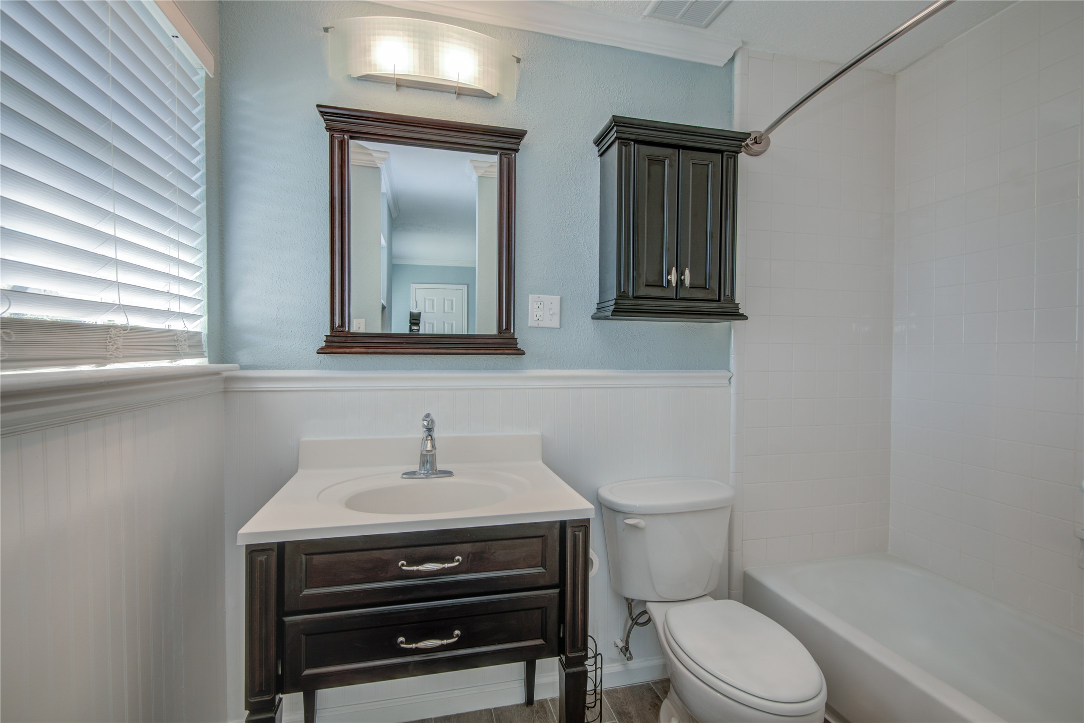 1424 Silverpines Road, Unit 1424 Houston, TX 77062 - Photo 21 of 33 a bathroom with a toilet a sink and mirror