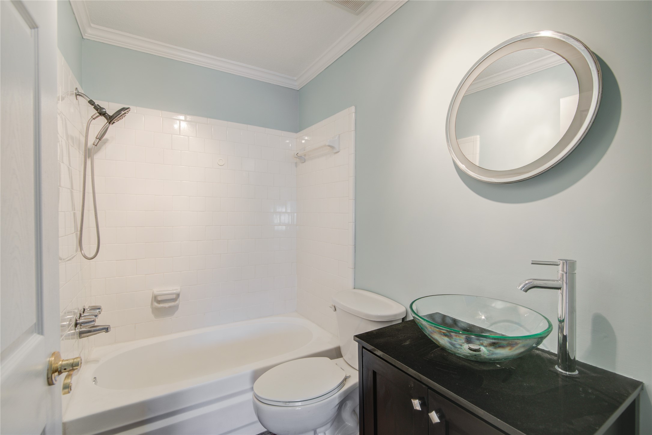 1424 Silverpines Road, Unit 1424 Houston, TX 77062 - Photo 27 of 33 a bathroom with a granite countertop toilet sink and mirror