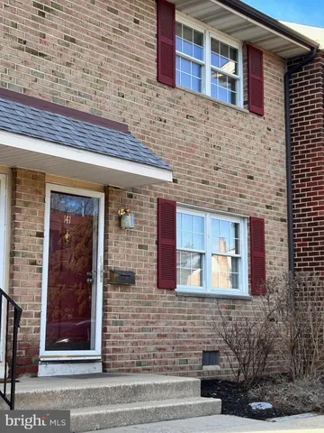 a front view of a building with a entryway