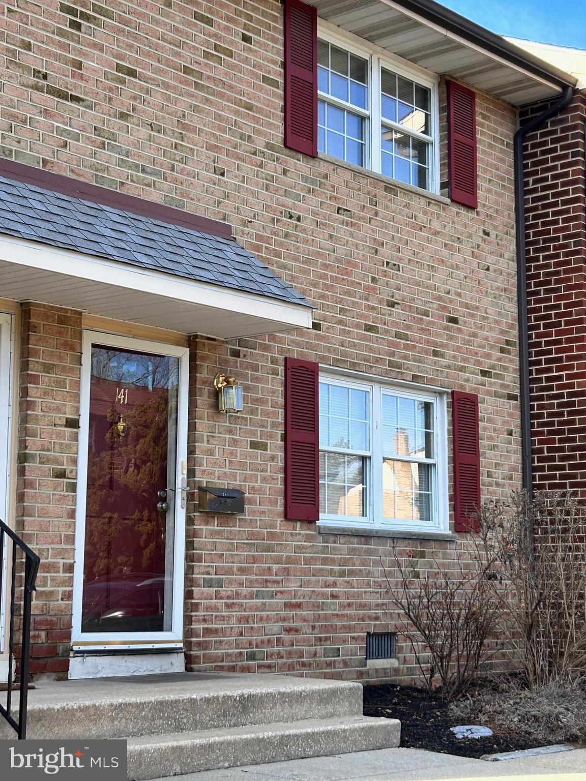 a front view of a building with a entryway