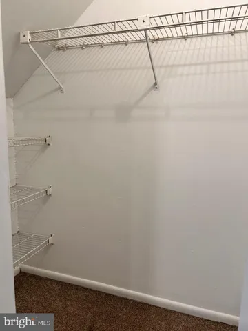 a view of small space with racks on the wall