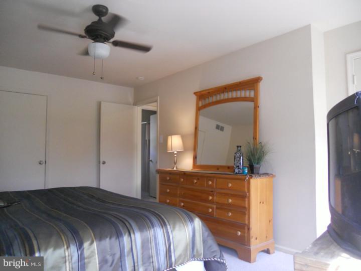 11 Nottingham Road Evesham, NJ 08053 - Photo 17 of 23 a bedroom with a bed and a dresser