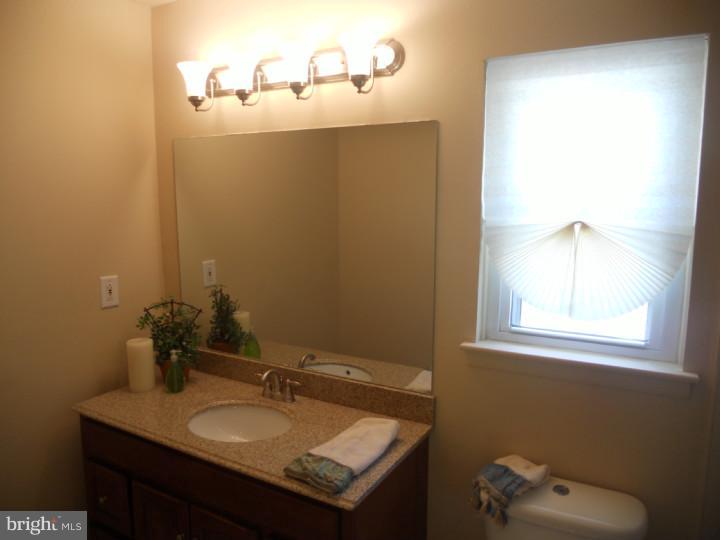 11 Nottingham Road Evesham, NJ 08053 - Photo 19 of 23 a bathroom with a sink and a mirror