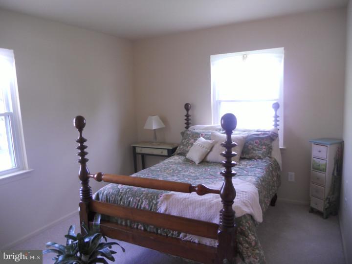 11 Nottingham Road Evesham, NJ 08053 - Photo 20 of 23 a bedroom with a bed and a window