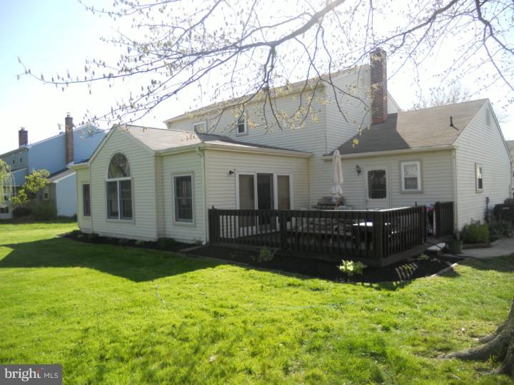 11 Nottingham Road Evesham, NJ 08053 - Photo 21 of 23 a view of a yard in front of a house with large tree