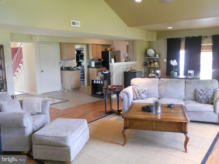 11 Nottingham Road Evesham, NJ 08053 - Photo 8 of 23 a living room with furniture and wooden floor