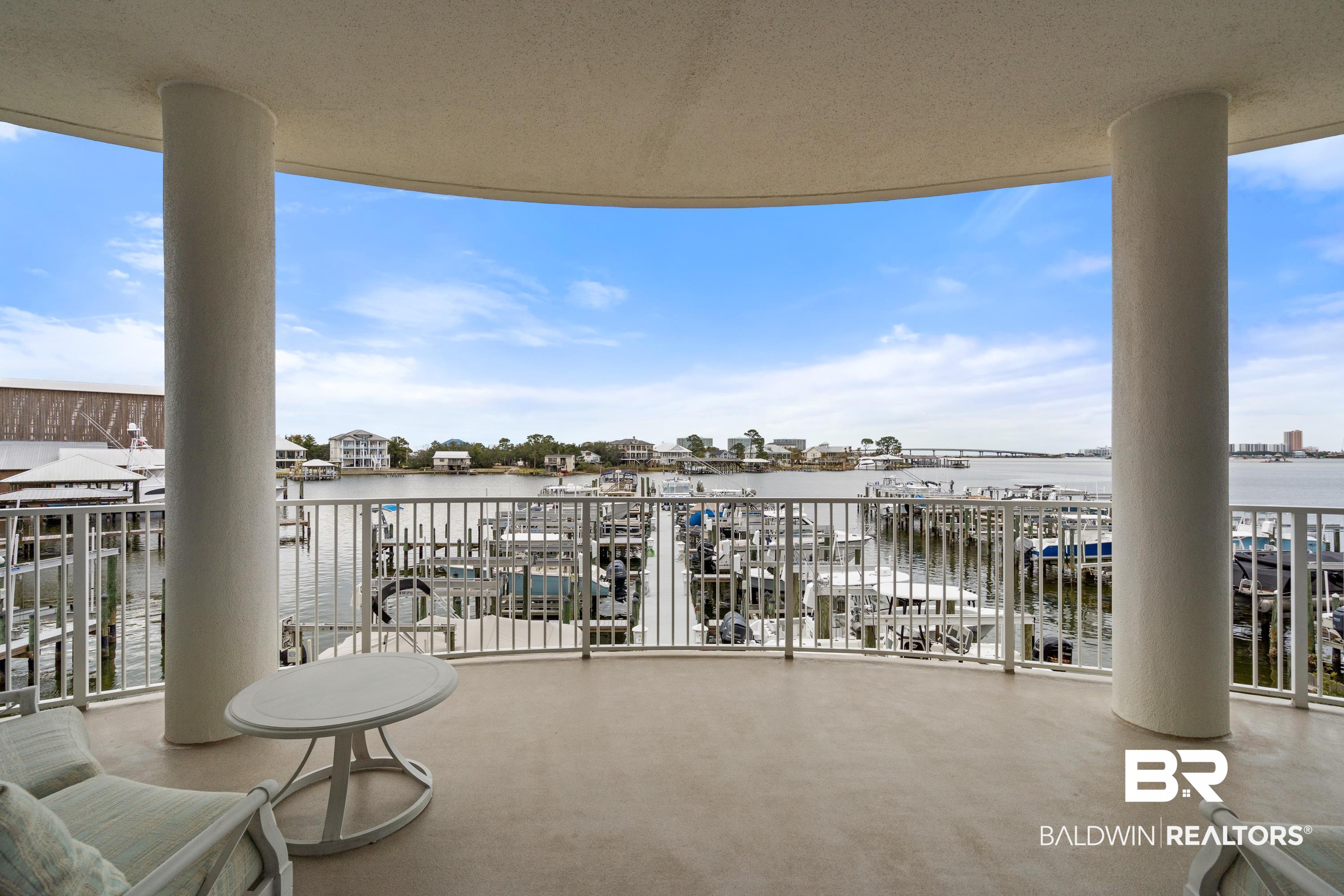 28250 Canal Road, Unit 101 Orange Beach, AL 36561 - Photo 19 of 34 Balcony with a water view