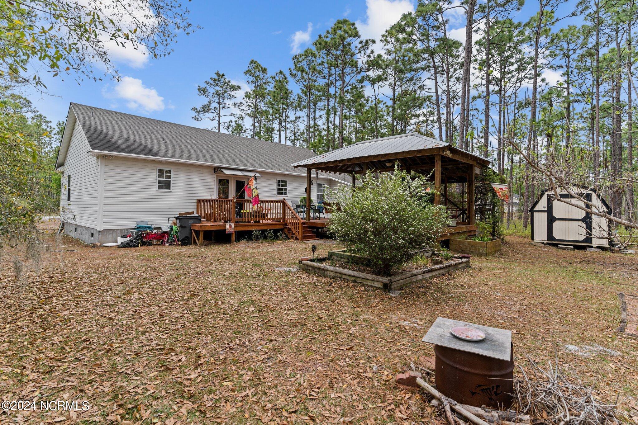 1310 Maple Road Southport, NC 28461 - Photo 44 of 50 BackyardMaple