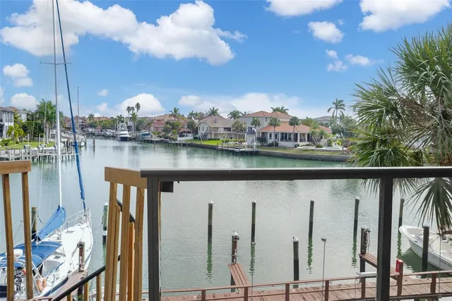 a view of a lake from a balcony