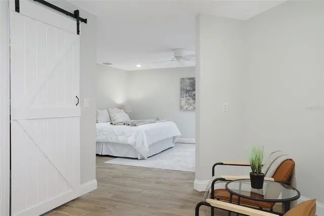 a balcony with furniture and a lake view