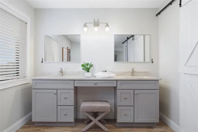 a view of a dining room with furniture and window