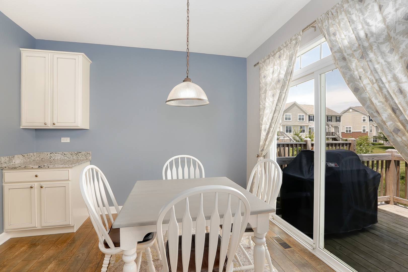 2827 Church Road Aurora, IL 60502 - Photo 11 of 30 a view of a dining room with furniture window and wooden floor