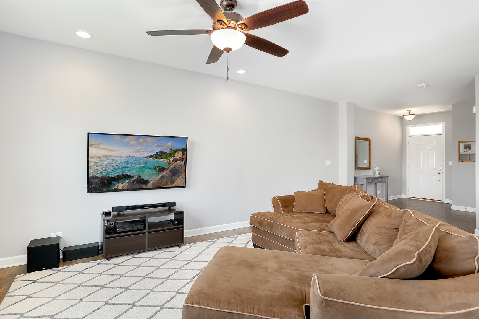 2827 Church Road Aurora, IL 60502 - Photo 7 of 30 a living room with furniture and a flat screen tv