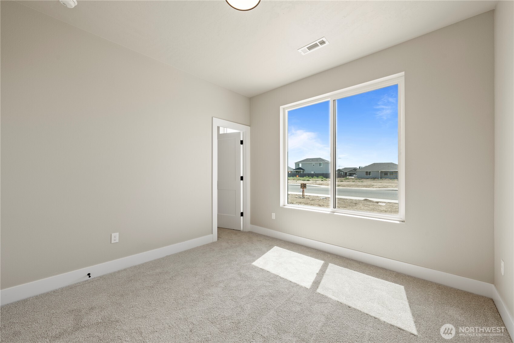 1121 E Mount Othello, WA 99344 - Photo 21 of 33 an empty room with a window