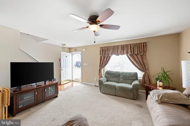 a kitchen with stainless steel appliances a stove a refrigerator and a sink