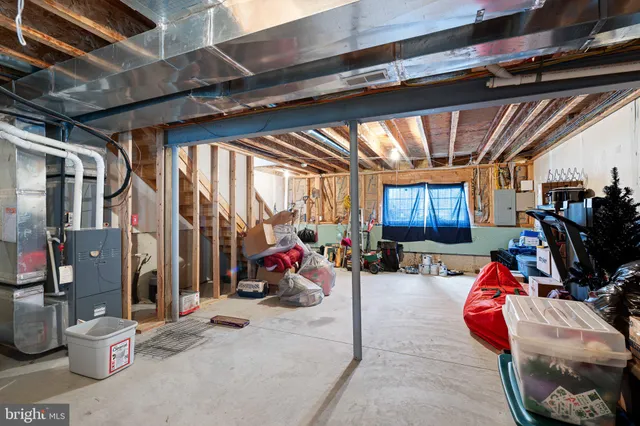 a view of a chairs and table in the balcony