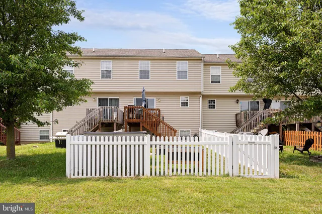 a view of front door with deck