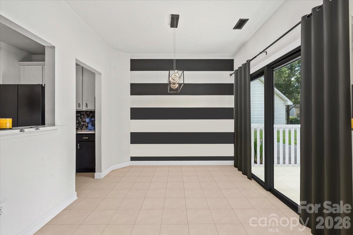 8836 Cornwall Street Locust, NC 28097 - Photo 11 of 42 a view of a livingroom with a balcony