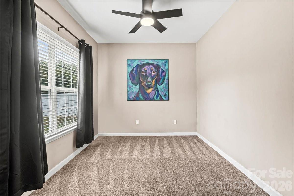 8836 Cornwall Street Locust, NC 28097 - Photo 14 of 42 a view of an empty room with a window