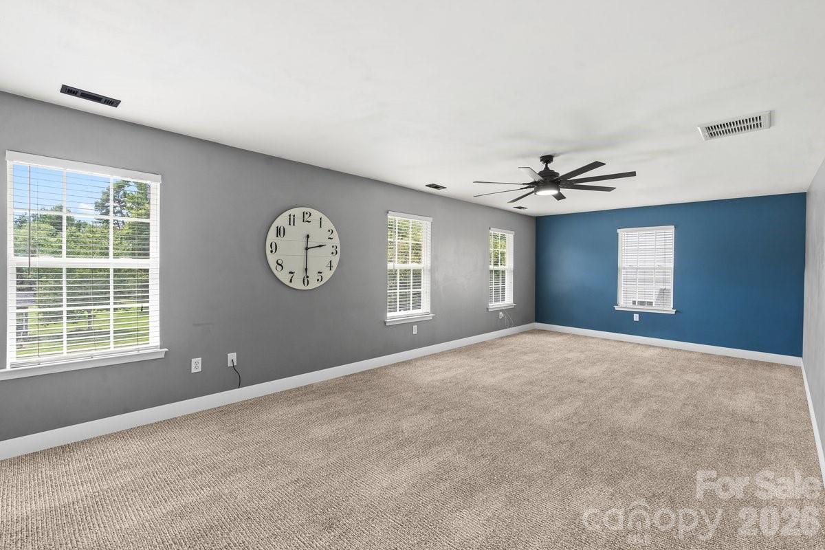 8836 Cornwall Street Locust, NC 28097 - Photo 20 of 42 a view of an empty room with a window