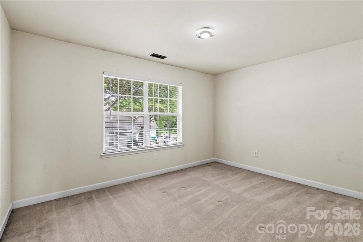 8836 Cornwall Street Locust, NC 28097 - Photo 23 of 42 an empty room with a window