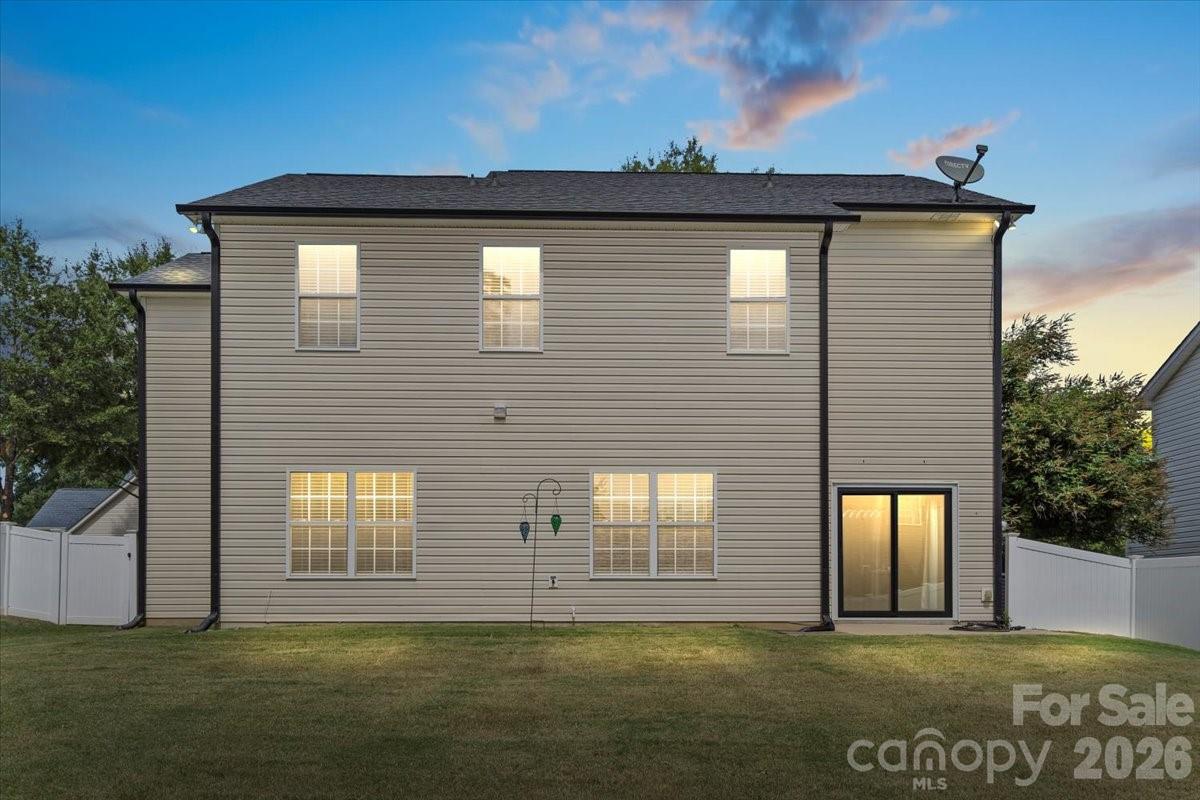 8836 Cornwall Street Locust, NC 28097 - Photo 30 of 42 a front view of a house with a yard