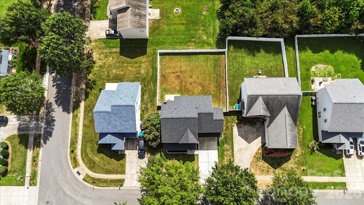 8836 Cornwall Street Locust, NC 28097 - Photo 39 of 42 an aerial view of a house with swimming pool garden and patio