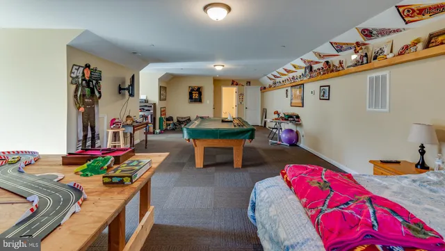 a bathroom with a sink toilet and a mirror