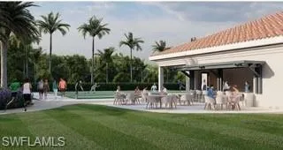 a view of a chairs and table in a yard