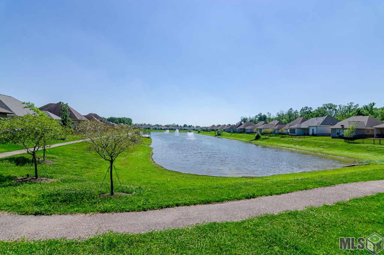 7967 Valencia Court Baton Rouge, LA 70820 - Photo 18 of 20 Walking path around pond
