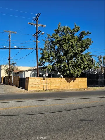 a picture of a building with a yard