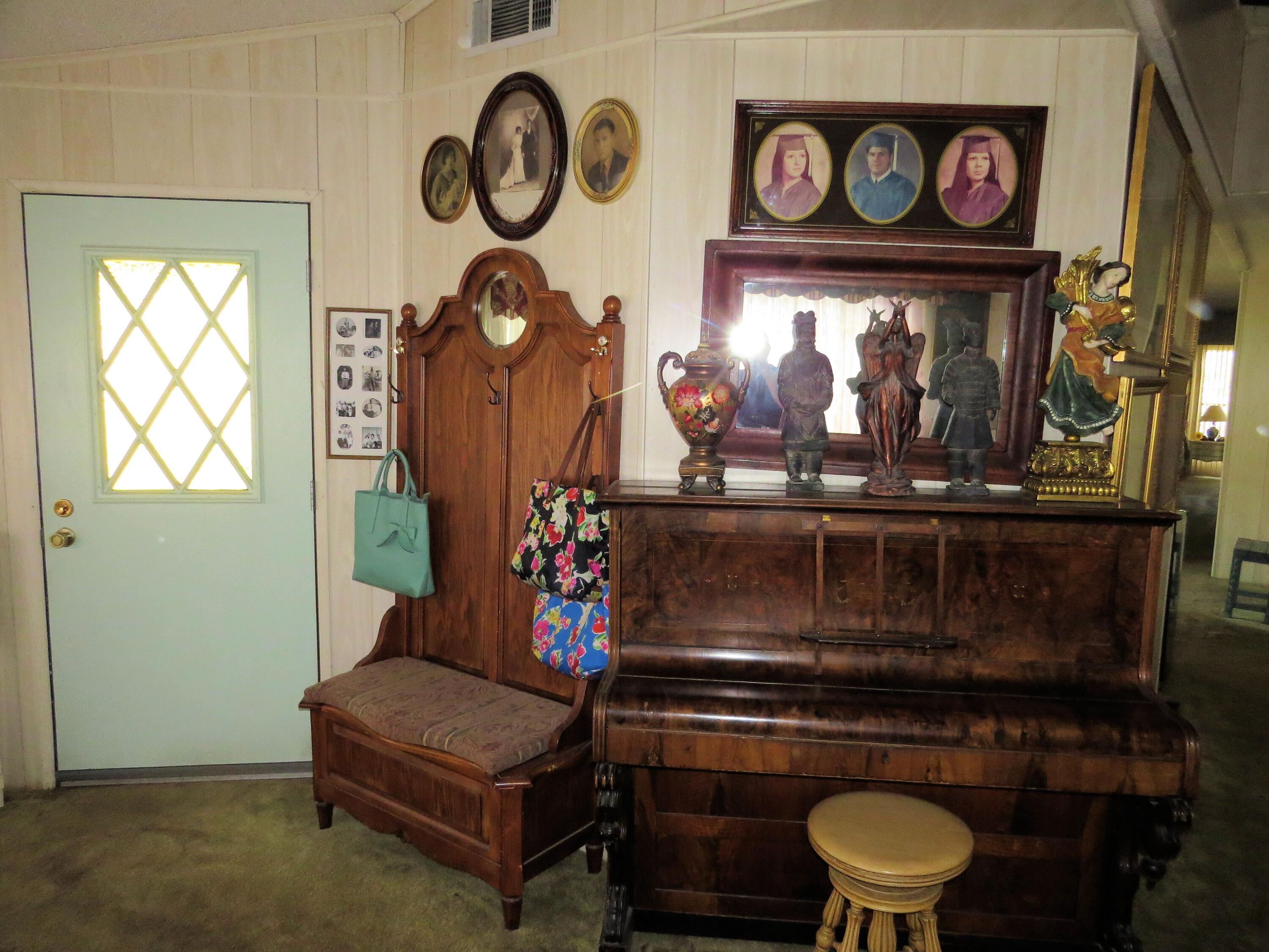 34980 Serenade Thousand Palms, CA 92276 - Photo 11 of 37 a living room with furniture and a window