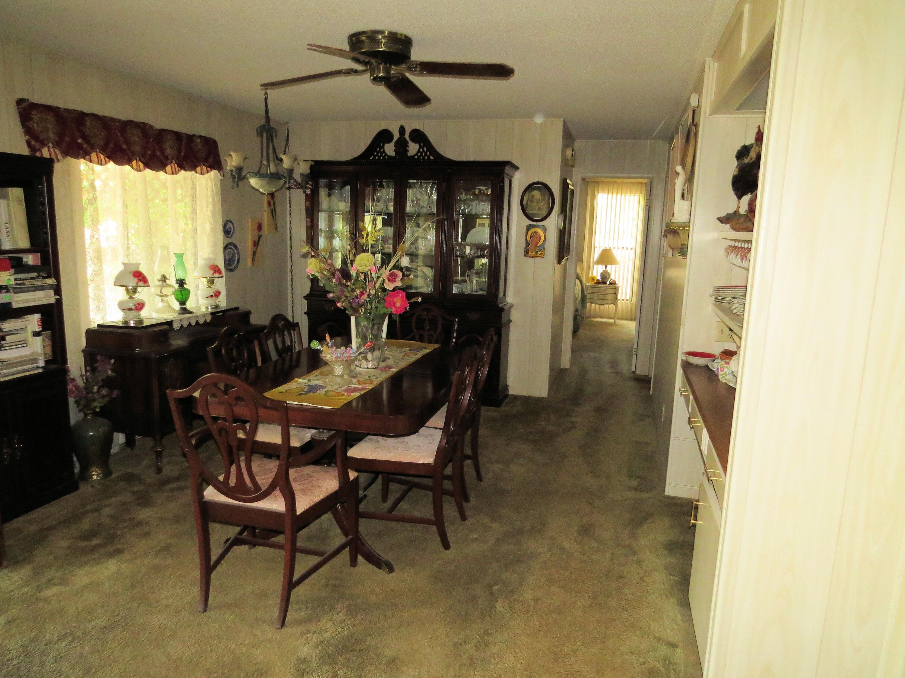 34980 Serenade Thousand Palms, CA 92276 - Photo 16 of 37 a view of a dining room with furniture and window