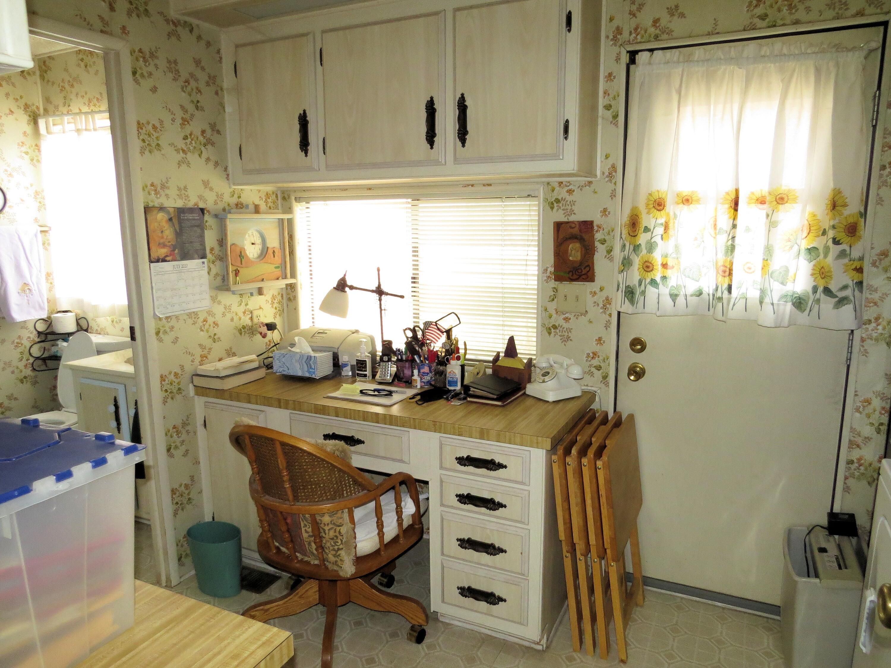 34980 Serenade Thousand Palms, CA 92276 - Photo 24 of 37 a room with table chairs and windows