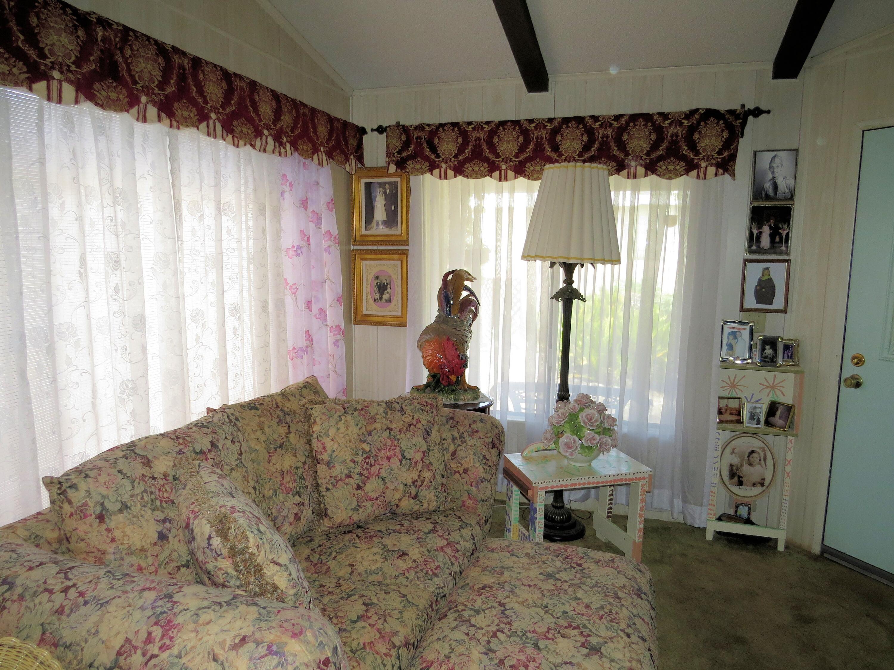 34980 Serenade Thousand Palms, CA 92276 - Photo 6 of 37 a bedroom with a bed and a window